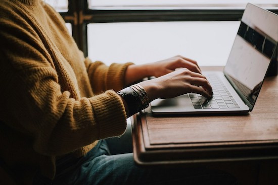 Person using laptop computer